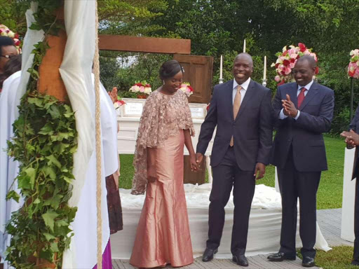 Deputy President William Ruto stands by former Agriculture CS Willy Bett and his wife during their wedding ceremony in Nairobi's Karen area, April 25, 2018. /COURTESY