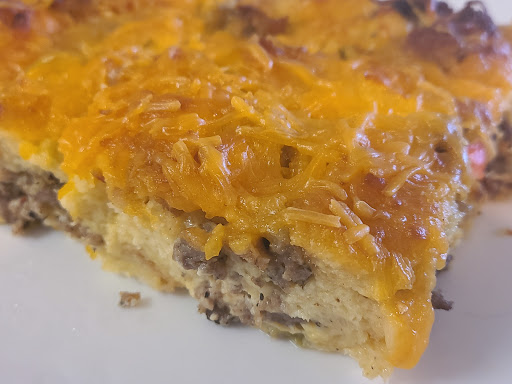 Crumbled sausage encased in fluffy egg, topped with gooey cheddar cheese