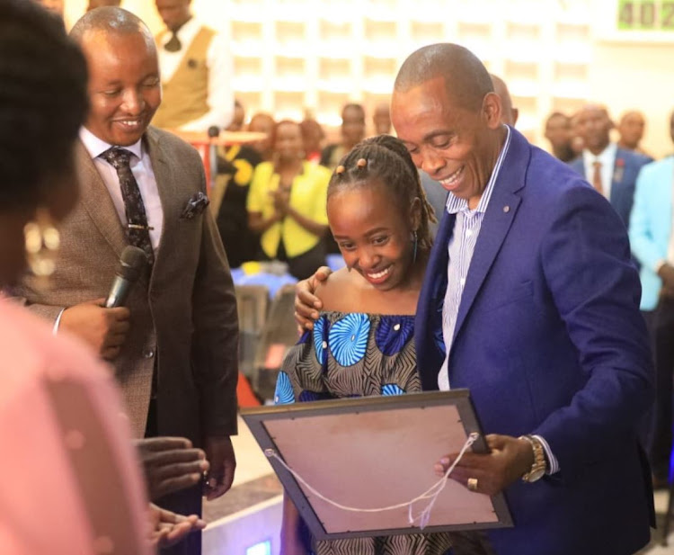 Kiambu governor Kimani Wamatangi with his supporters on Sunday at Kenya Assembly of God church in Maraba Witeithie Ward, Juja Sub County. The governor during his address announced creation and gazettment of 7 more municipalities in Kiambu County.