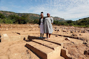 Philile Gumbi, 28, and Phila Gumbi, 31, amid the ruins of what was once their home in Wushwini, near Hillcrest, west of Durban. Both their daughters were swept away by the deadly deluge that covered parts of KwaZulu-Natal three weeks ago.