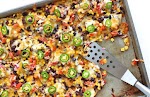 Sheet Pan Chicken and Black Bean Nachos was pinched from <a href="http://thebakermama.com/recipes/sheet-pan-chicken-and-black-bean-nachos/" target="_blank">thebakermama.com.</a>
