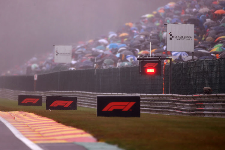 The start of the F1 Grand Prix of Belgium at Circuit de Spa-Francorchamps is delayed due to poor weather conditions.