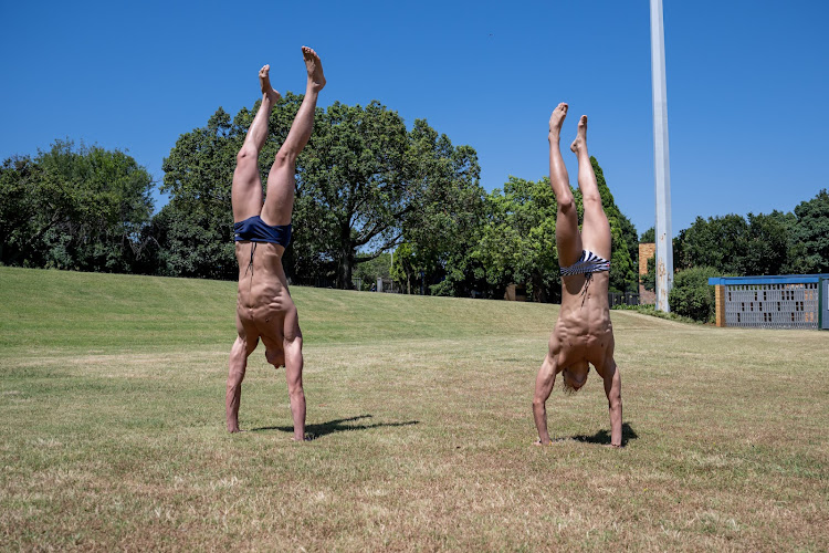 Pieter Coetzé and Matthew Sates do handstands as part of their training in Pretoria earlier this year.