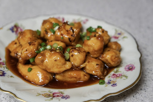 Spicy honey chicken in medium plate