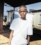 SLAIN:  Thabo Tshabalala was   stabbed to death   in the classroom by a fellow pupil