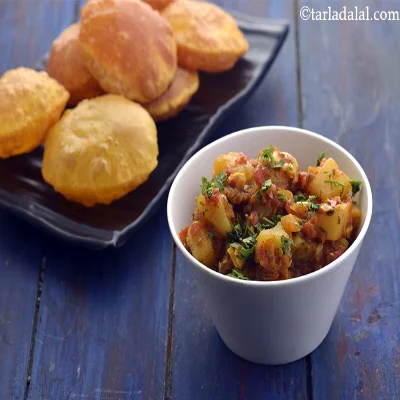 Poori ( 4Pcs ) + Aloo Matar Dry + Raita