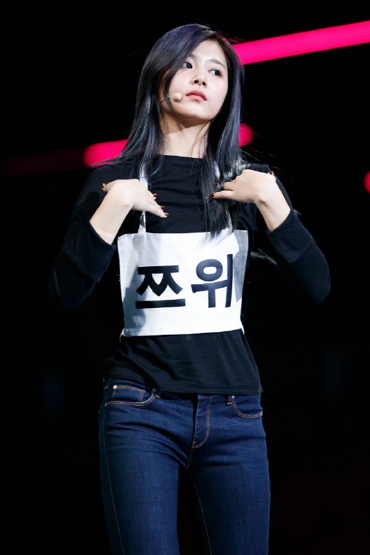 Tzuyu presents an innocent appearance as she rehearses for the stage. 