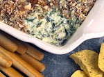 Pecan Crusted Spinach Artichoke Dip was pinched from <a href="http://www.meals.com/recipe/pecan-crusted-spinach-artichoke-dip-28000" target="_blank">www.meals.com.</a>