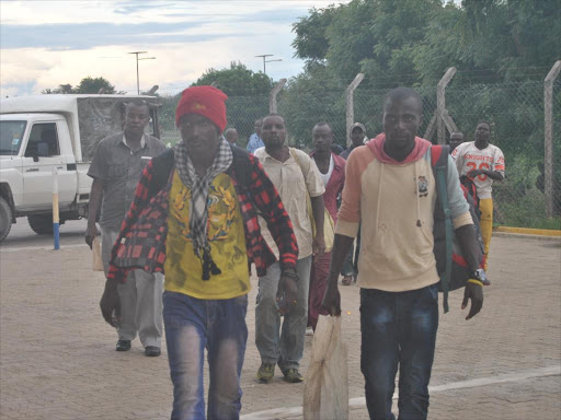 Some of the returnees who had been rescued from al Shabaab in Somalia arriving back home at the Malindi International Airport on April 30, 2018. /ALPHONCE GARI