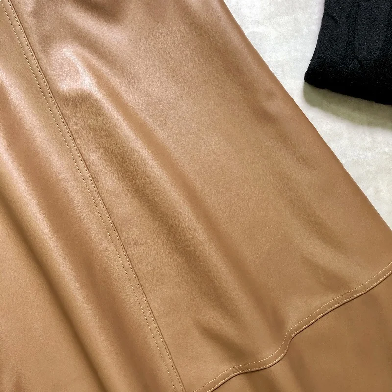 Saia de couro PU Outono Inverno com cinto de fivela de metal. Elegância e estilo para o seu guarda-roupa, ideal para looks sofisticados.