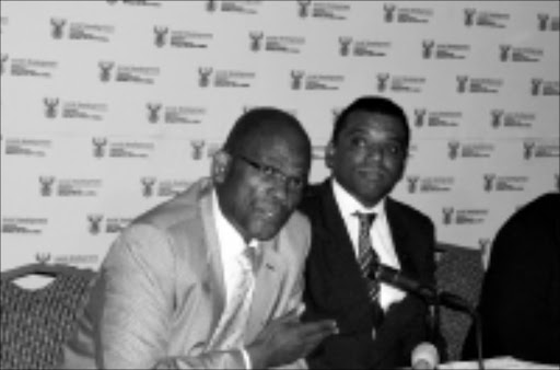 CORRUPTION BUSTER: Social Development Minister Zola Skweyiya and the deputy head of the Special Investigating Unit Faiek David in Pretoria yesterday. PIC. McKeed Kotlolo. 09/2008. © Sowetan.