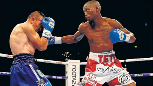 BORING BOUT: Zolani Tete, right, sets up his opponent, Omar Andres Narvaez, for a left-hand punch, during their WBO world bantamweight title fight in Belfast, Northern Ireland at the weekend Picture: REUTERS