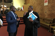 Attorney Sthembiso Mathenjwa and Advocate Veli Sibeko outside the Pietermaritzburg High Court on 02 July 2018. 