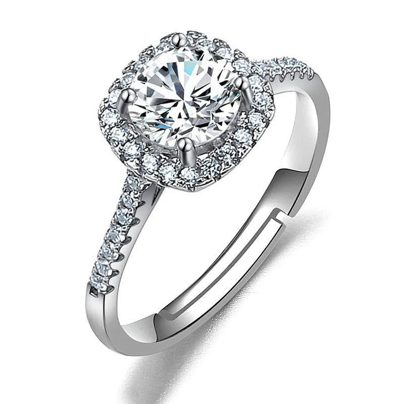 Title 15, Damesring met imitatie moissaniet diamant. Schi...