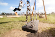 In one of the videos the kids are seen playing close to the jungle gym. A lady carrying a broom, runs after one child and hits the child over the head. File photo.