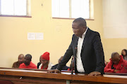 EFF leader Julius Malema stands in the dock.