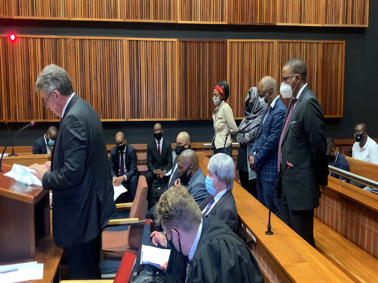 Former Gauteng health department officials Sybil Ngcobo, Mmakgosi Mosupi, Valdis Ramaano and Obakeng Mookeletsi appear in court on Thursday. They face charges of corruption and contravention of the Public Finance Management Act.