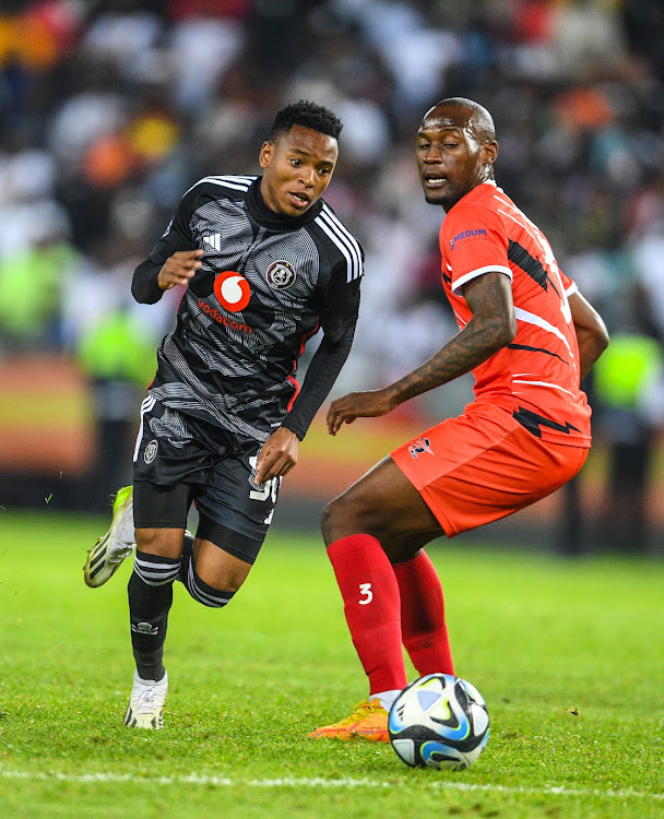 Relebohile Mofokeng of Orlando Pirates and Doctor David of Jwaneng Galaxy during the CAF Champions League, 2nd preliminary round at Orlando Stadium on Friday