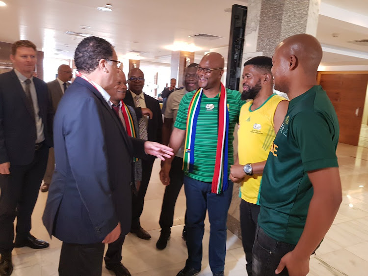 Sports Minister Nathi Mthethwa and SA Football Association Danny Jordaan meets SA super fans in Cairo, Egypt during the Africa Cup of Nations. Safa has called for the suspension of all football "indefinitely".