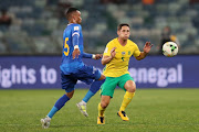 Dean Furman is challenged by Nuno Rocha ( l) during the 2018 FIFA World Cup Qualifier match between South Africa and Cape Verde at Moses Mabhida Stadium on September 05, 2017 in in Durban, South Africa. 