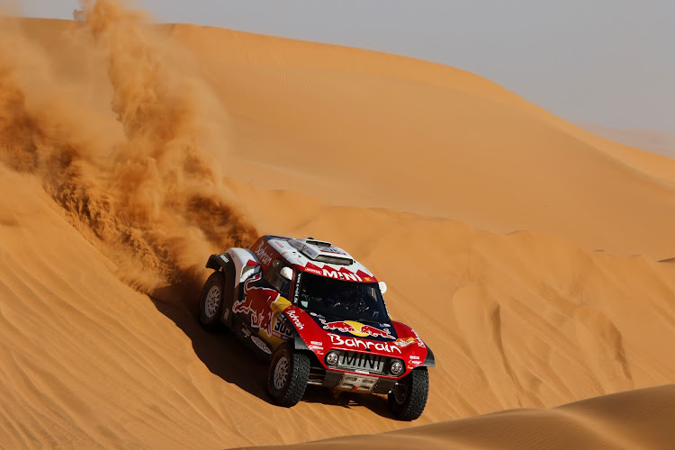 Carlos Sainz has a 10-minute lead in the Dakar Rally, with one stage left to go.