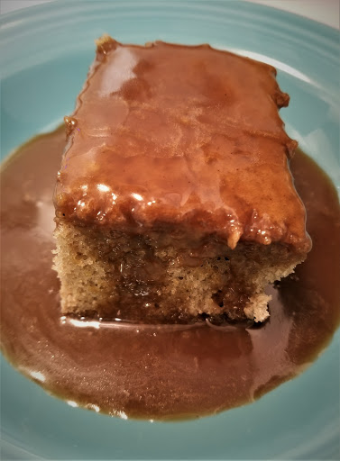 Moist and delicious spice cake served with a warm brown sugar sauce