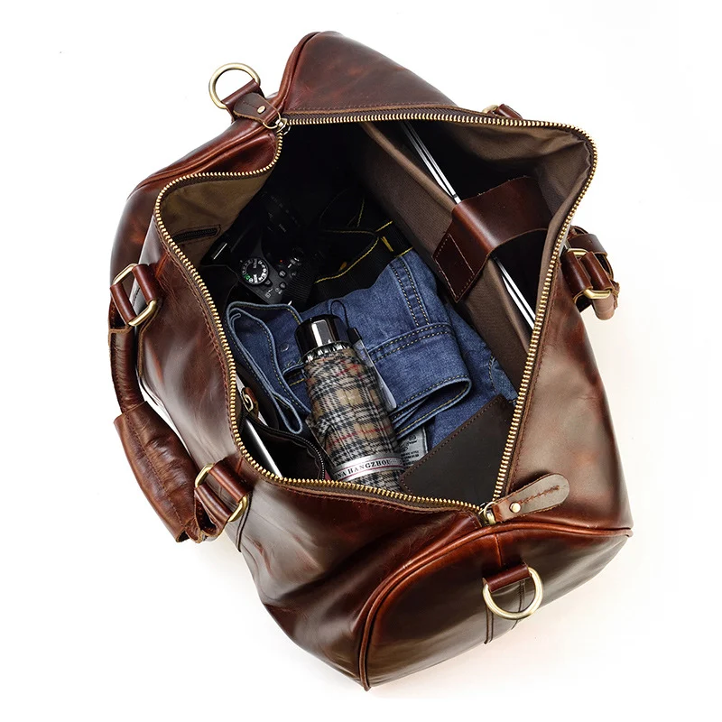 Bolsa de mão grande em couro bovino, casual, com ampla capacidade para carregar tudo o que você precisa com conforto e estilo. Ideal para o dia a dia.