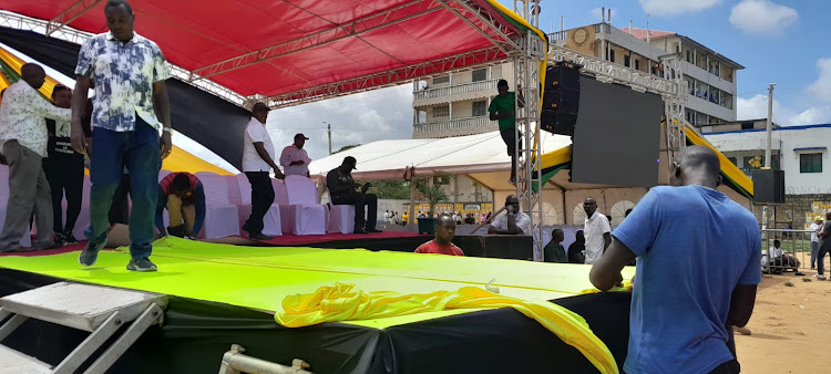 Workers working on the main dais at the Tononoka grounds Mombasa on Thursday.