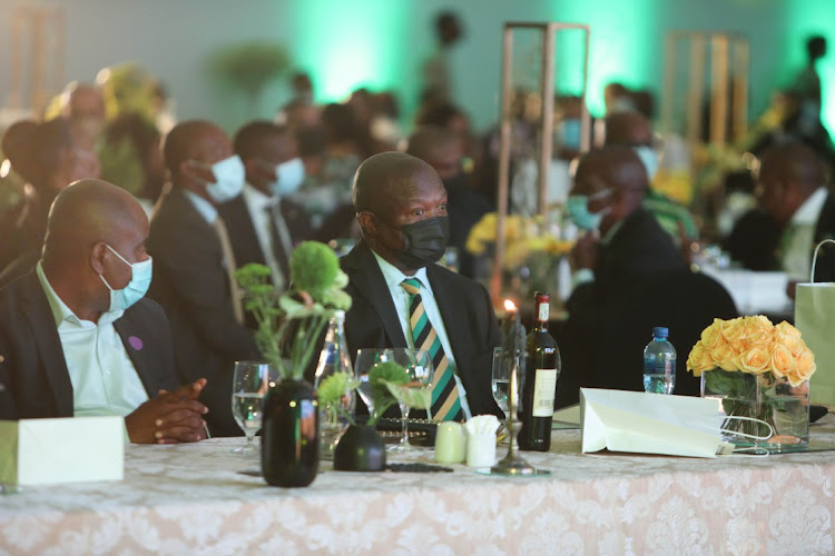 ANC deputy president David Mabuza takes his seat at the ANC fundraiser.