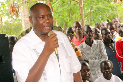 Busia Governor Sospeter Ojaamong' during the burial of Semeyo Emojong, 90, in Kasinge village, Teso North subcounty.