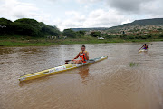 Andy Birkett finishes first on the first day of the Dusi.