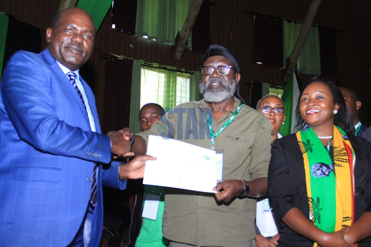 IEBC Chair Wafula Chebukati clears Roots Party Presidential candidate George Wajackoyah to vie the presidency at the Bomas of Kenya on Thursday, June 2, 2022.