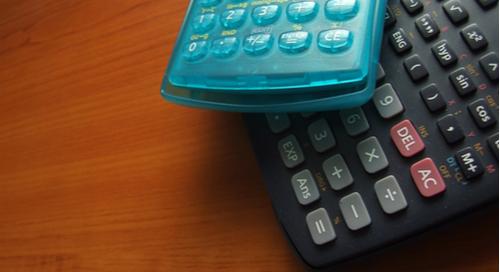  Calculators on a wood  table