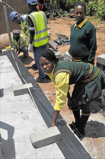 DETERMINED: Siblings Philly and Tinyiko are not affected by their circumstance as they push towards getting their matric qualifications. The siblings, from Metsi village in Mpumalanga, will do their matric at Ian MacKenzie High School this year.