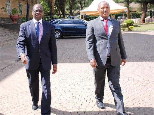 Retired Chief Justice Willy Mutunga with Judiciary Director of Communication Naim Bilal./FILE