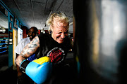 Hedda Wolmarans attacks the bag with her trainer Vusi Mtolo in the background. Picture: Moeletsi Mabe