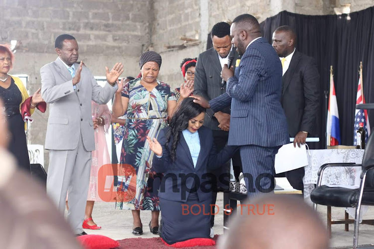 Size 8 with her dad Mr Munyali at her ordination