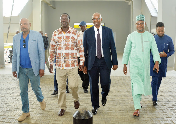 ODM leader Raila Odinga with Azimio spokesperson Makau Mutua and other officials in Abuja, Nigeria on January 30,2023.