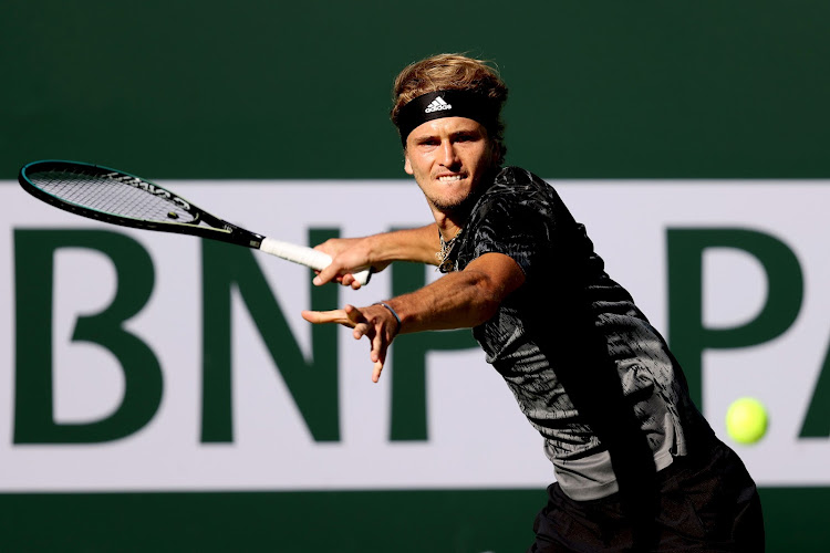 Alexander Zverev of Germany returns a shot to Jenson Brooksby during the BNP Paribas Open at the Indian Wells Tennis Garden on October 10, 2021 in Indian Wells, California