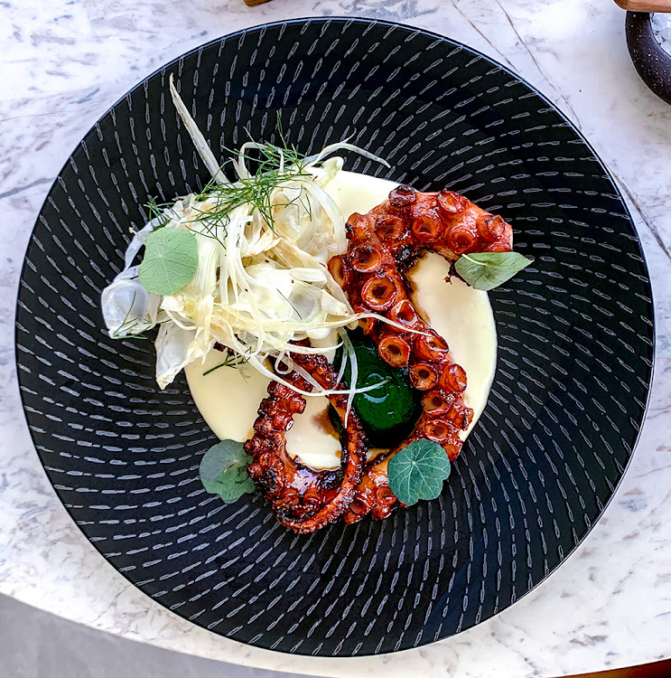 Octopus served with a blood orange glaze and a fennel salad.