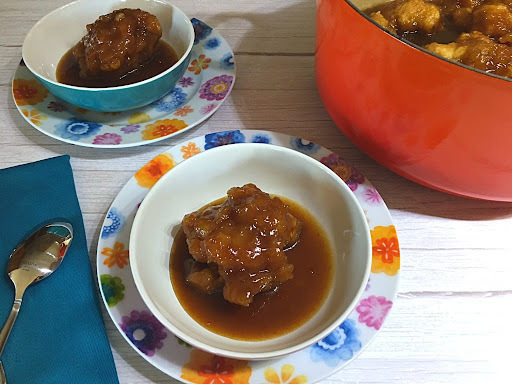 A couple maple dumplings in a serving bowl.