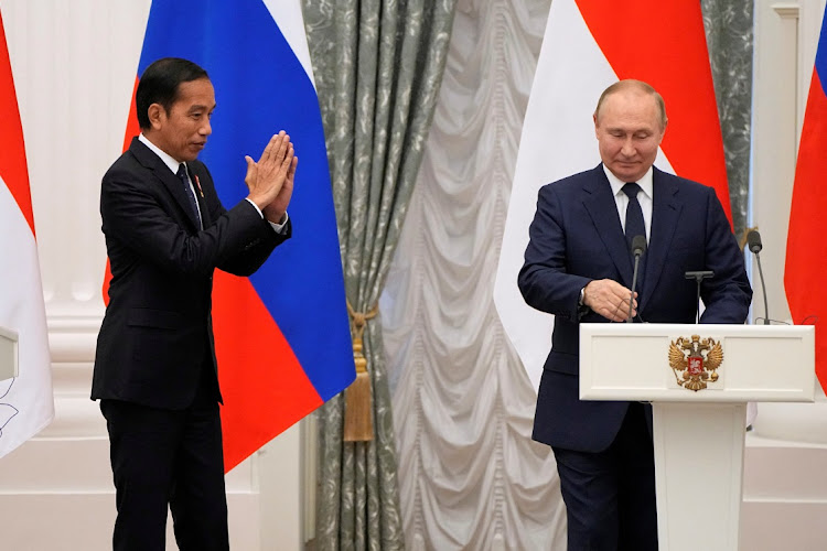 Russian President Vladimir Putin and Indonesian President Joko Widodo attend a joint news conference following their meeting in Moscow, Russia, on June 30 2022.