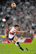 Elton Jantjies of the Lions converts another penalty kick during the Absa Currie Cup match against the Sharks at Ellis Park in Johannesburg on Saturday. He finished with 23 points as the Lions won 28-19