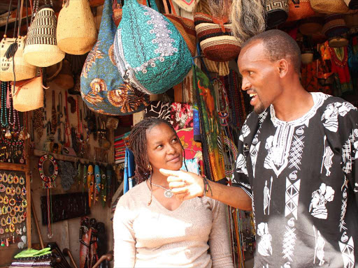 ON A ROAD RESERVE: Curio dealers at the Westlands Triangle on March 26, 2014.