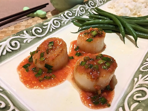 Three gorgeous scallops topped with a lovely Blood Orange Miso sauce.