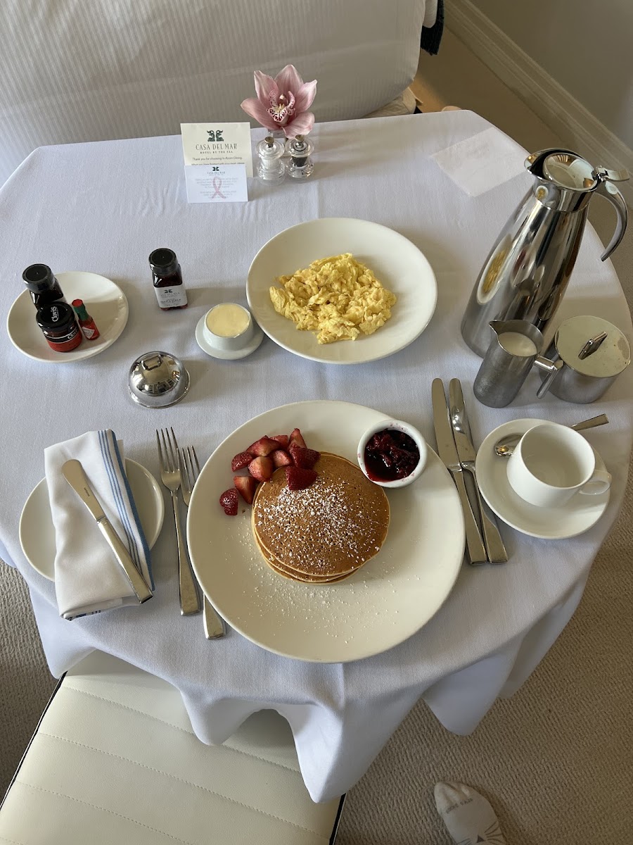 Gluten free pancakes with a side of scrambled eggs