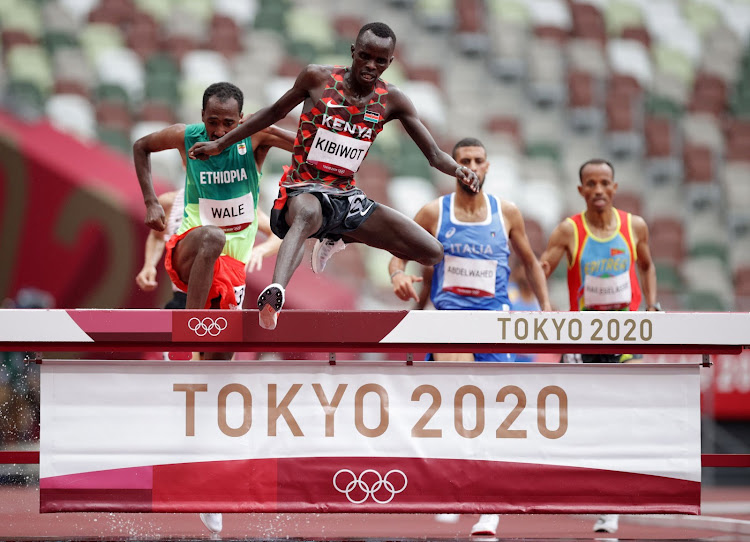 Abraham Kibiwott on his way to victory in heat 2 of the men's 3,000m steeplechase.