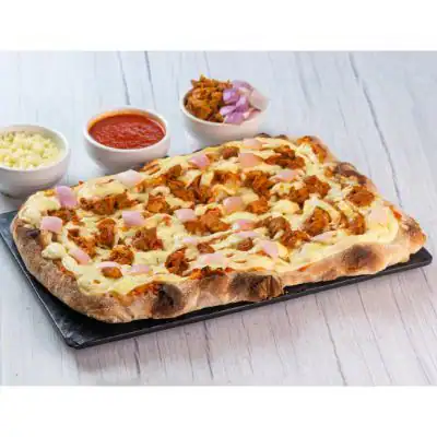 Classic Butter Chicken Onion Pinsa Slice