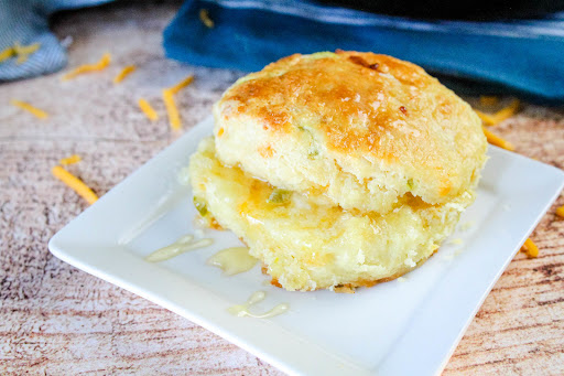 Jalapeno and Cheddar Biscuit with butter and honey.