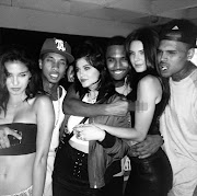 Kendall and Kylie Jenner with Tyga, Chris Brown and Trey Songz at a private party.